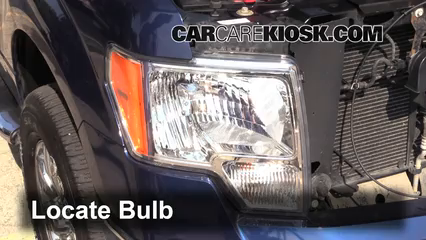how to change a headlight on a 2002 ford focus